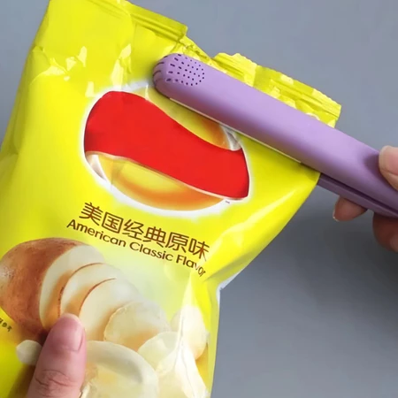 Mini seladora portátil manual estilo chapinha, para selar geladinhos e outras embalagens de alimentos bivolt 110 e 220v - Imagem 2